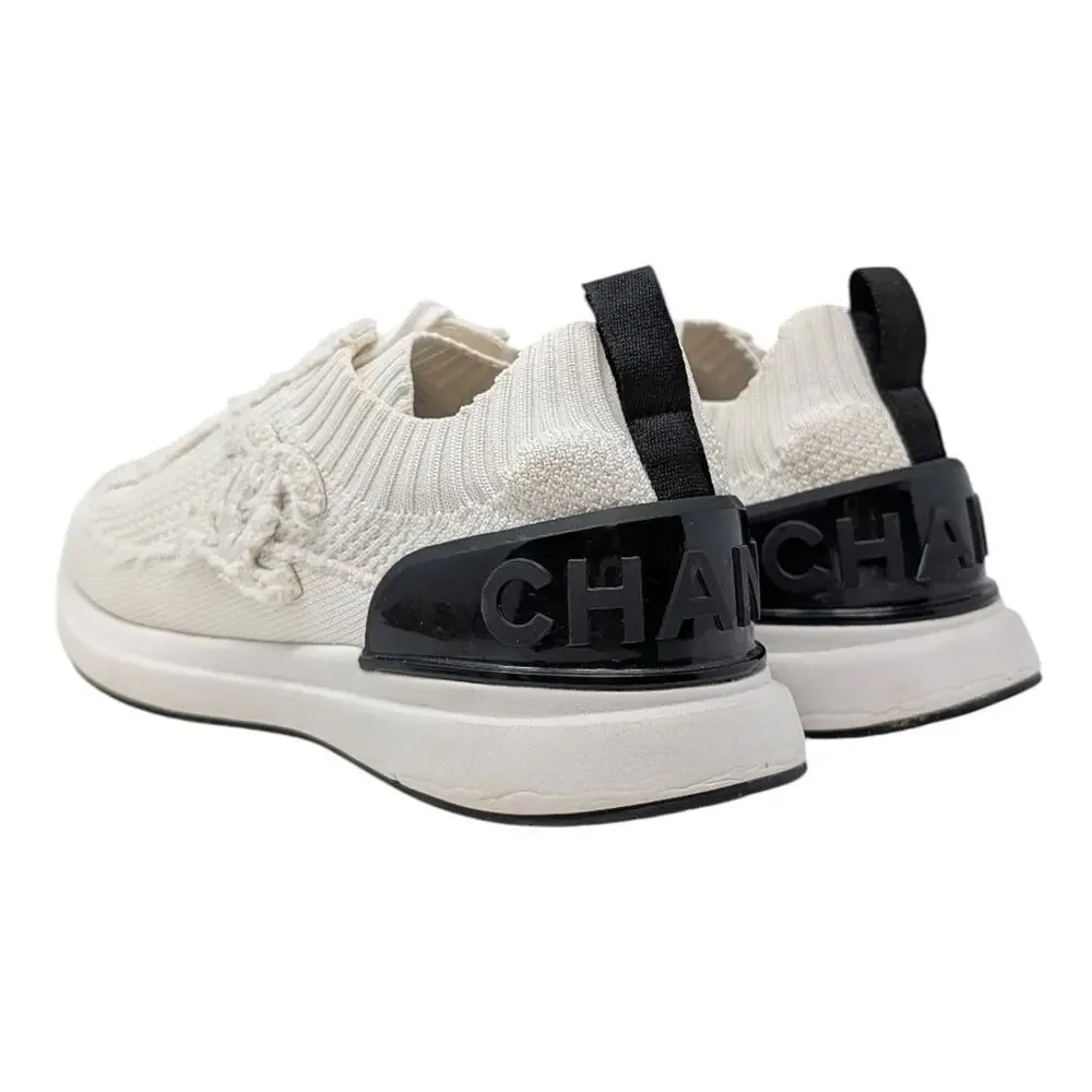 Chanel 2021 CC Logo Knit Sneakers Slip On White Black Athletic 39.5 | 9 | 8.5
